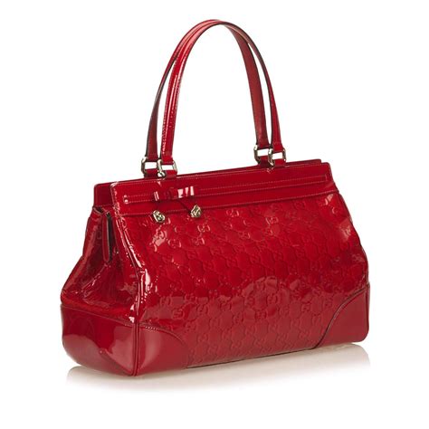 red patent leather purse.